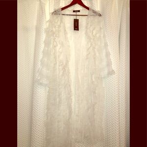 Sheer white ruffle duster